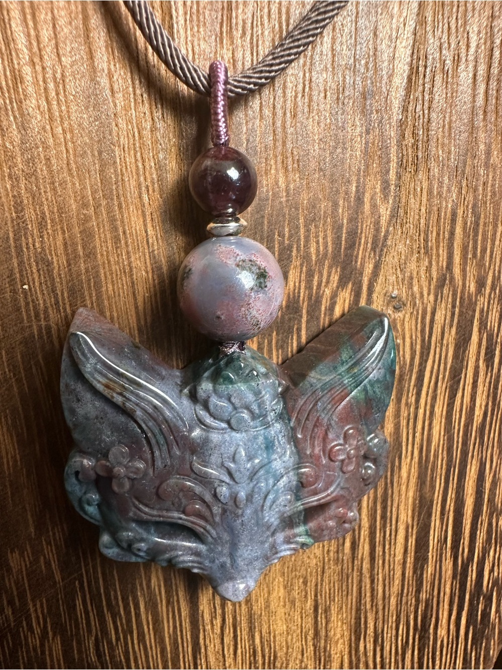 Blue & Purple Ocean Jasper Fox Mask Pendant Necklace on Brown Rope with Garnet - Picture 8 of 13